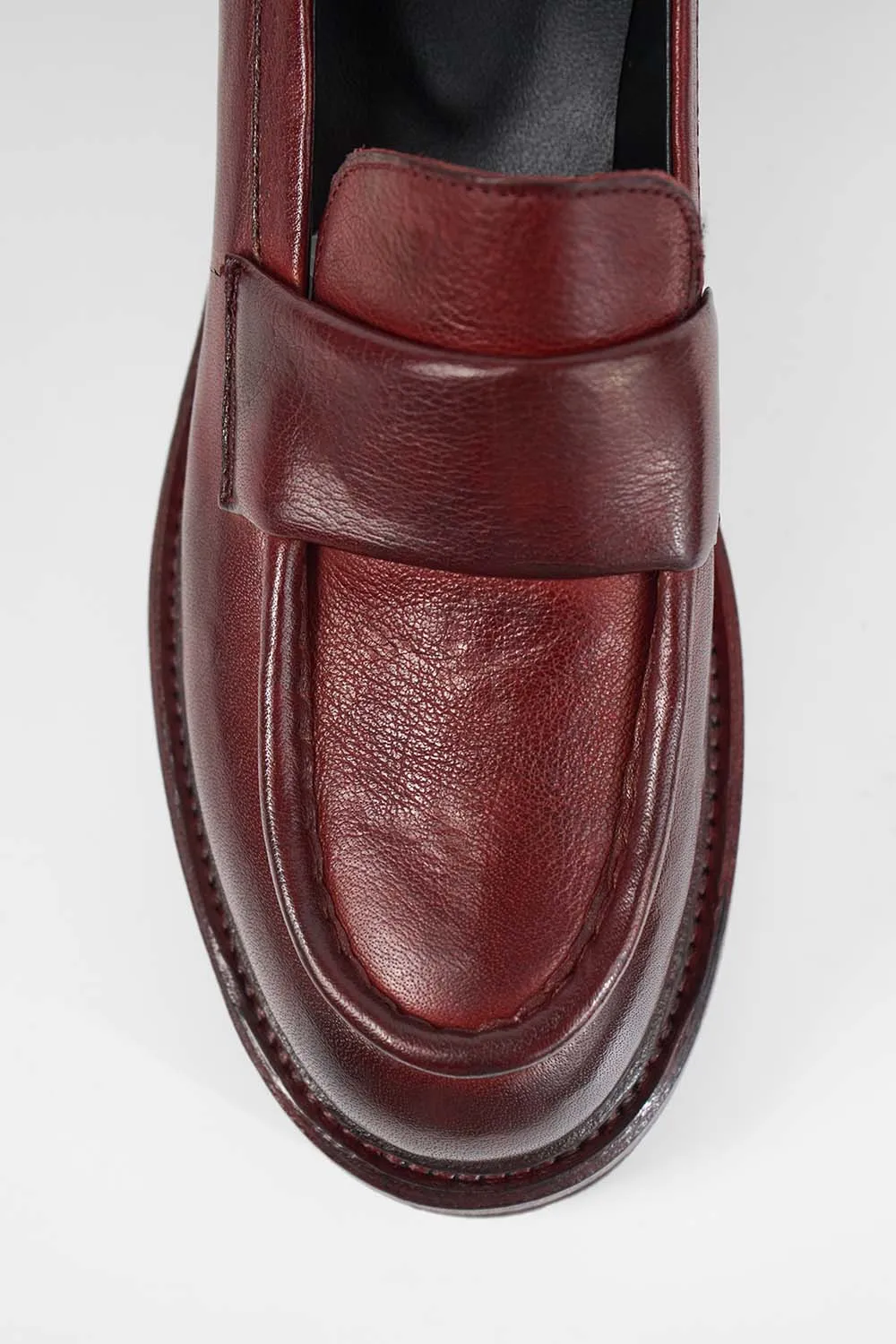 CAMDEN red-berry slip on shoes.
